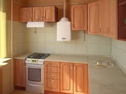 wnętrze małej kuchni z gazowym podgrzewaczem wody